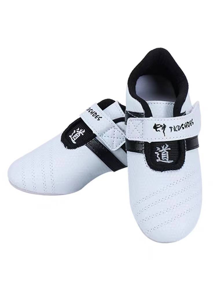 A young boy with taekwondo shoes trained a soft man and a man to become a humanistic booty