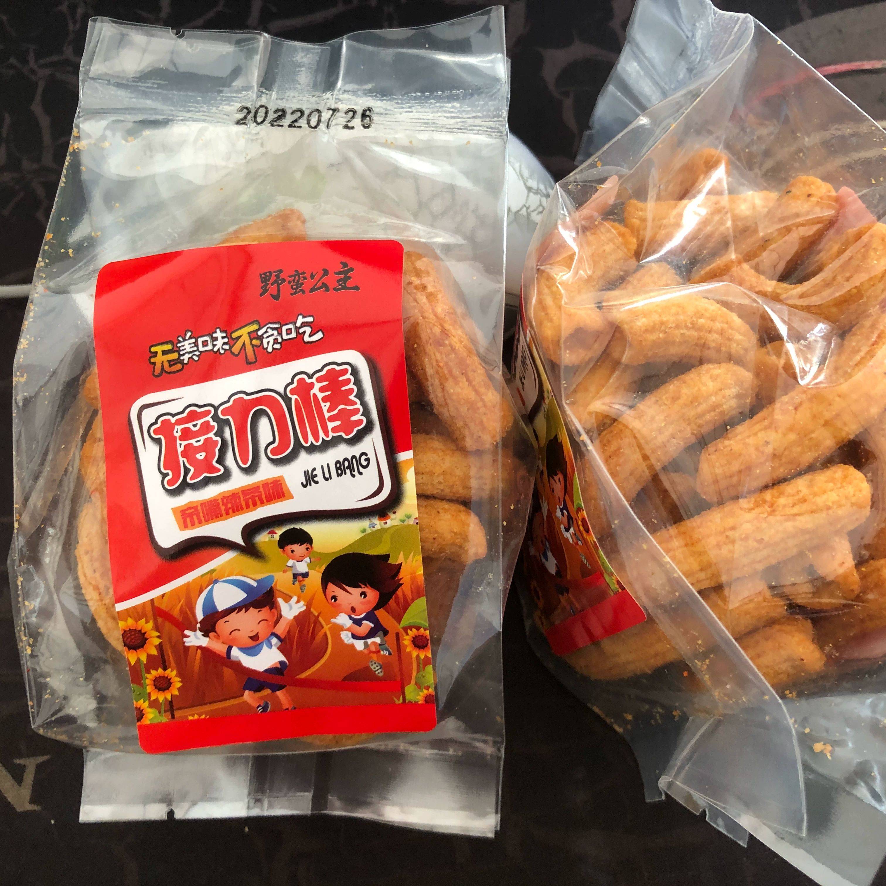 The relay rod fried rice cake bar kisses and spicy flavor over 25 minus 3 yuan net red small snacks Shandong hot sales