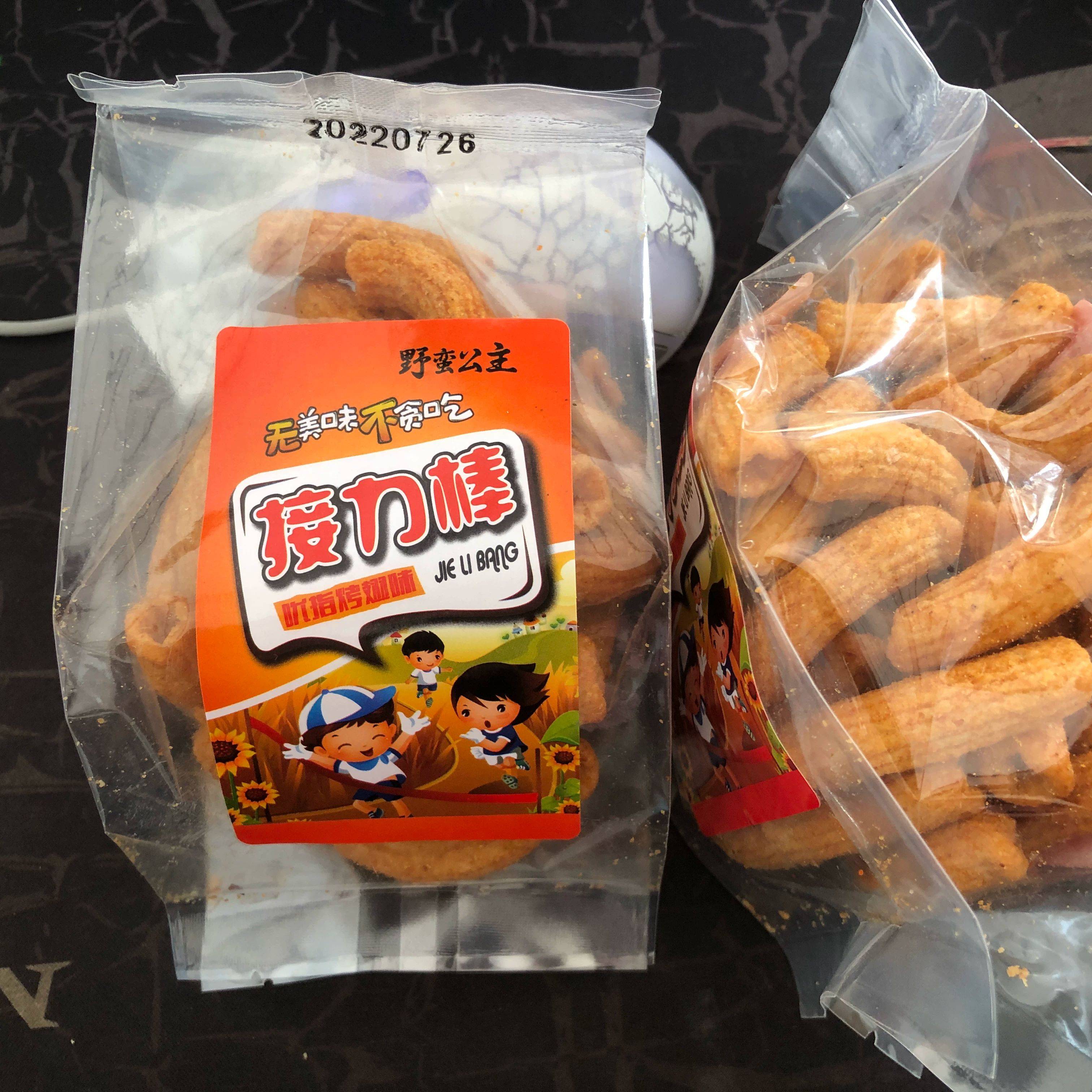 The relay rod fried rice cake bar kisses and spicy flavor over 25 minus 3 yuan net red small snacks Shandong hot sales