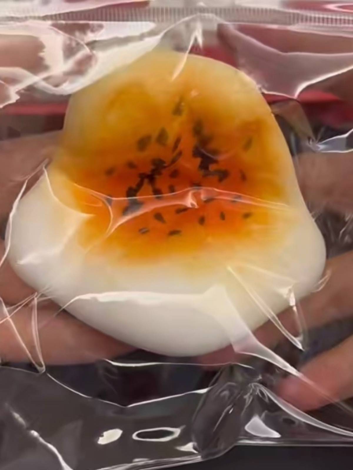 Fluid yogurt squeezing and playing with the children's hands to make fun of the red-fun-floating creative pressure relief