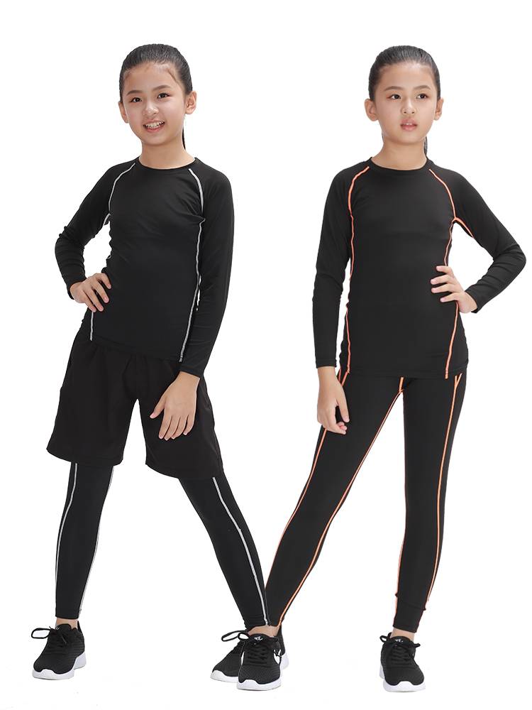Sports basketball for girls with children in shorts, running in shorts, a football dryer suit, gym pants