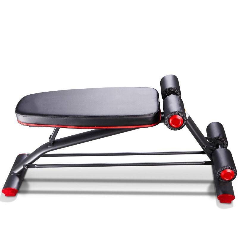 The new commercial multi-purpose dumb-bell stool at the running machine's head, with the abdominal plate on the back