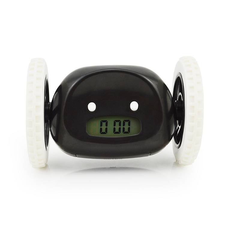 It's a black alarm clock, a battery, a screwdriver