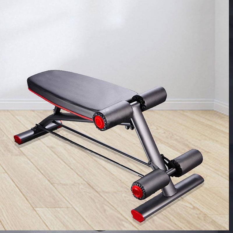 The new commercial multi-purpose dumb-bell stool at the running machine's head, with the abdominal plate on the back
