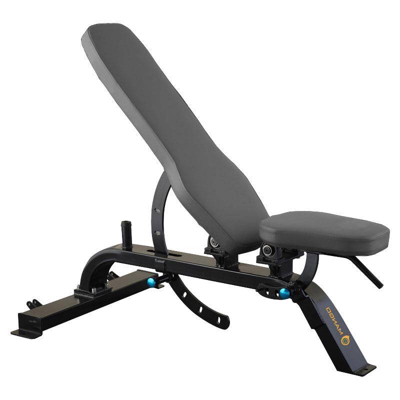 The new commercial multi-purpose dumb-bell stool at the running machine's head, with the abdominal plate on the back