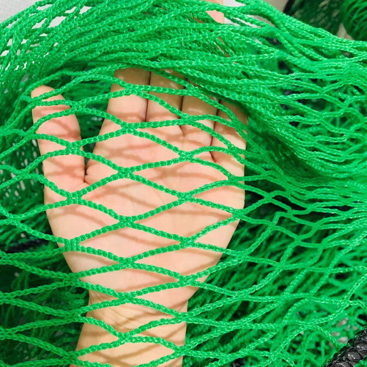 Green golf indoor exercise network no network sports ball network venue intercepting the fence of the football field polyethylene network
