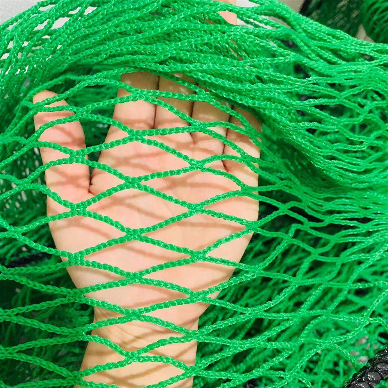 Green golf indoor exercise network no network sports ball network venue intercepting the fence of the football field polyethylene network