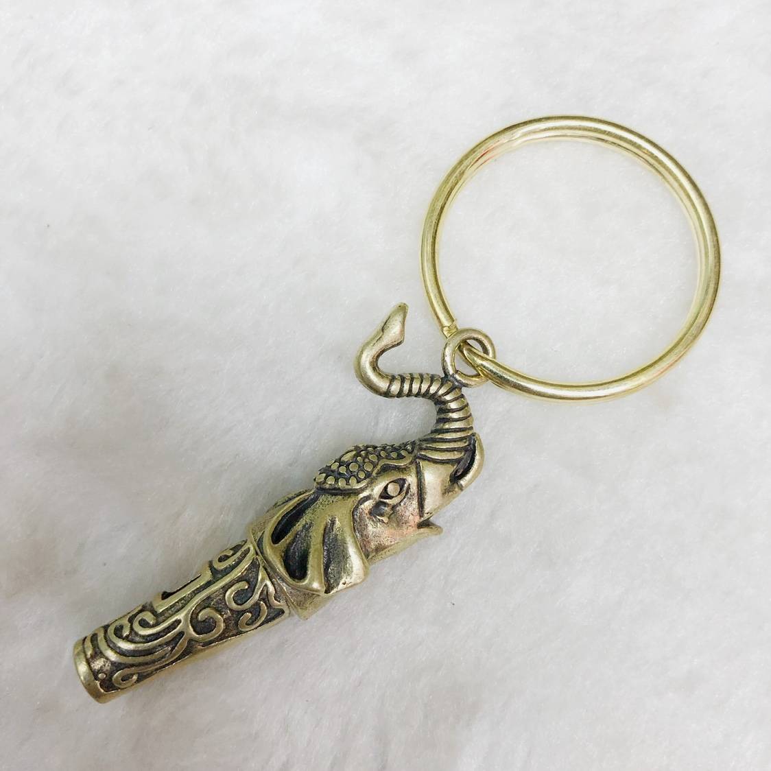 Elephant mouth whistle