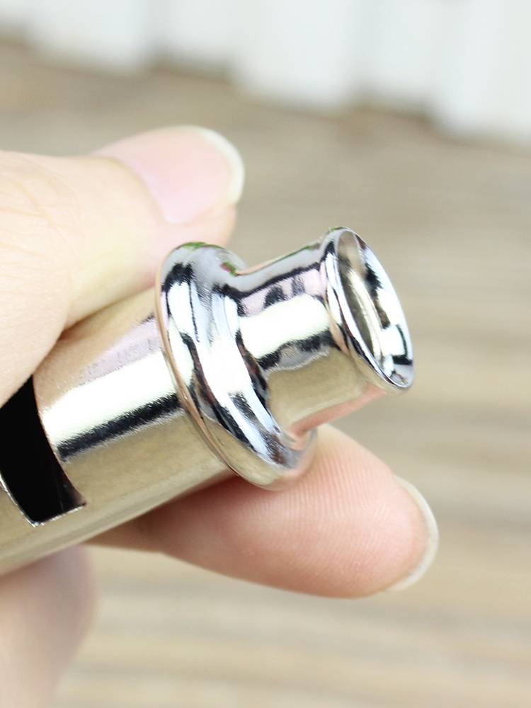 The referee's metal whistle