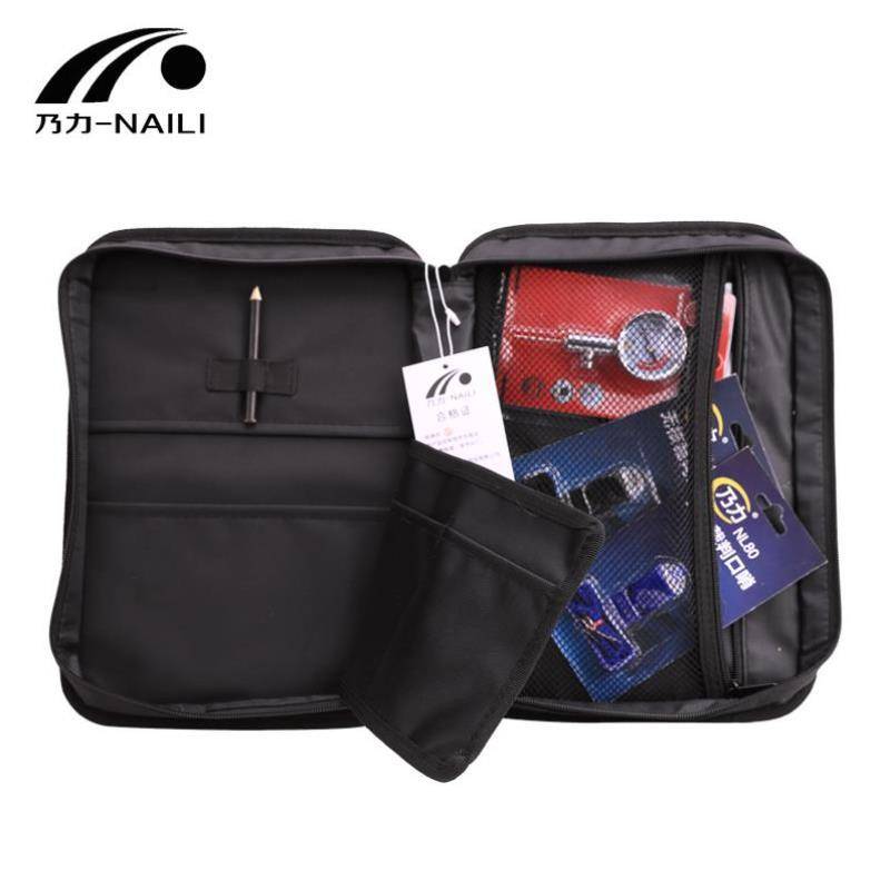 The referee's soccer bag, the referee's kit, the referee's red and yellow air pressure table picker