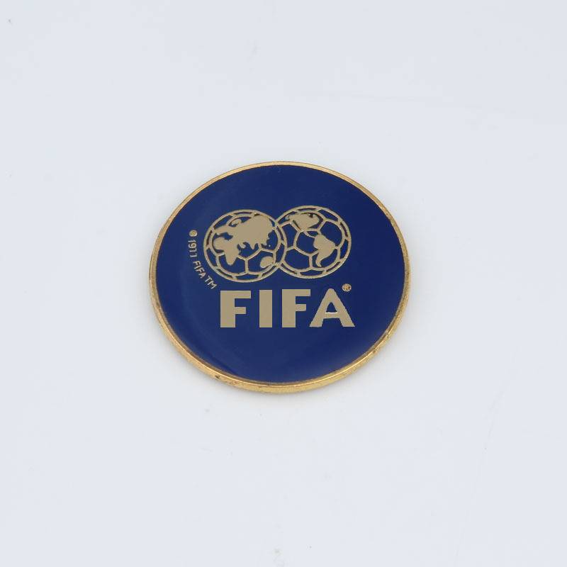 The football referee picks the margin referee, picks the edger, picks the edger, picks the coin, packs the mail referee
