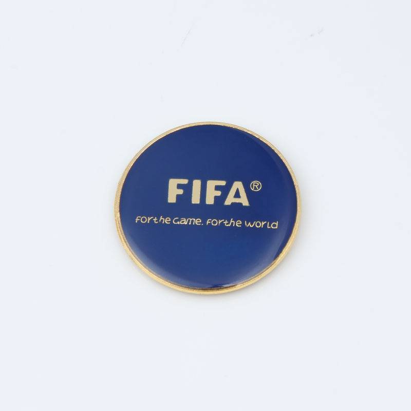 The football referee picks the margin referee, picks the edger, picks the edger, picks the coin, packs the mail referee