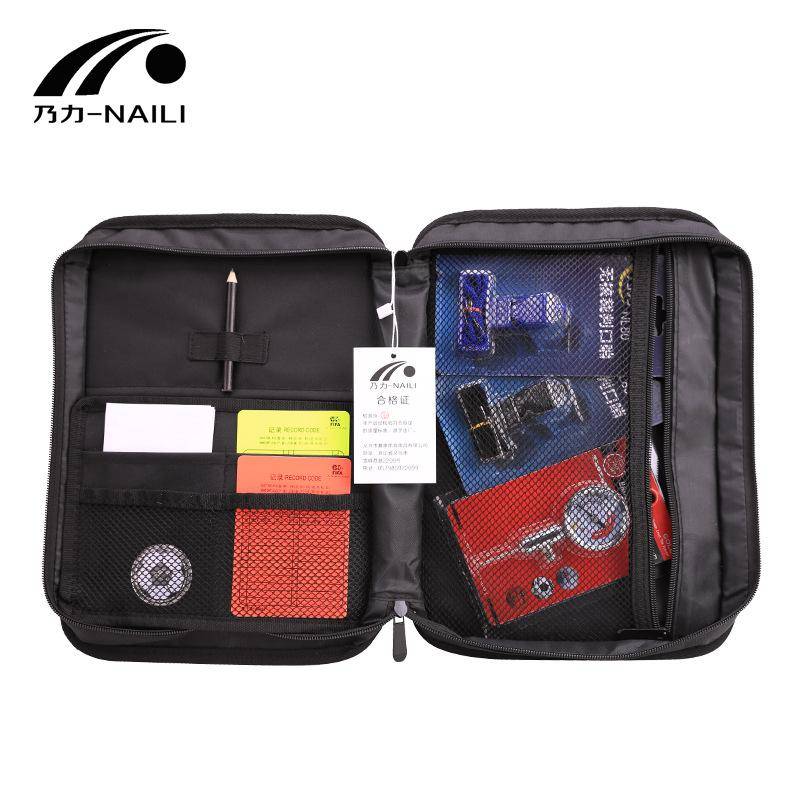 A FLAG BAG FOR THE F-SET AIR-PRESSURES BY THE RED-AND-YELLOW TABLE FOR THE REFEREE FOOTBALL KIT