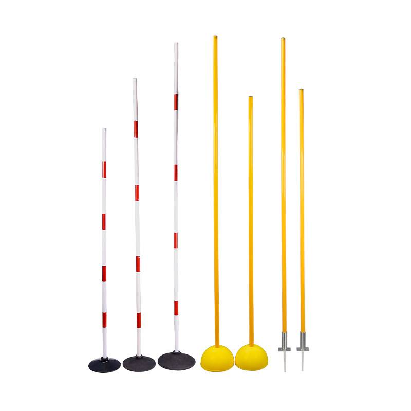 Soccer Auxiliary training poles for children in basketball, red and white sports around the corc and snakes
