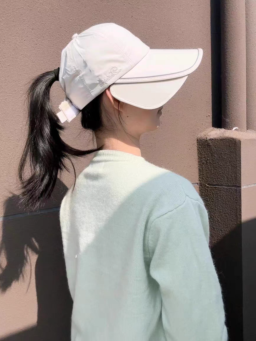 The sunscreen baseball cap girl can stretch and fold the duck tongue cap man up his hat