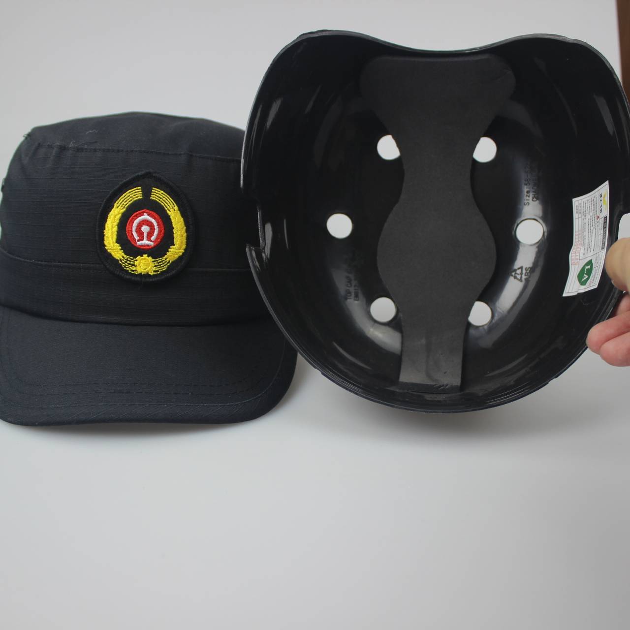 The railway bike works with a cap and badge