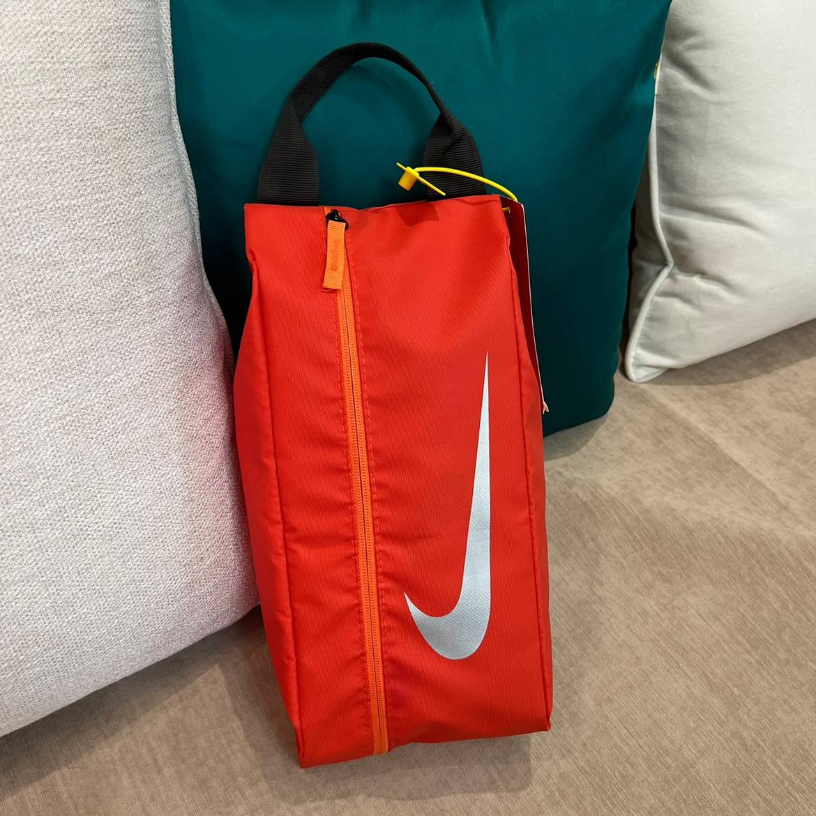 Orange football shoes bag