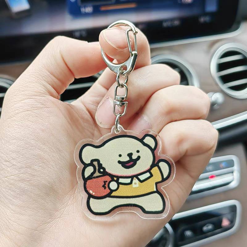 Cute high -value line puppy sports will play table tennis badminton basketball swimming keychain pendant around the puzzle games