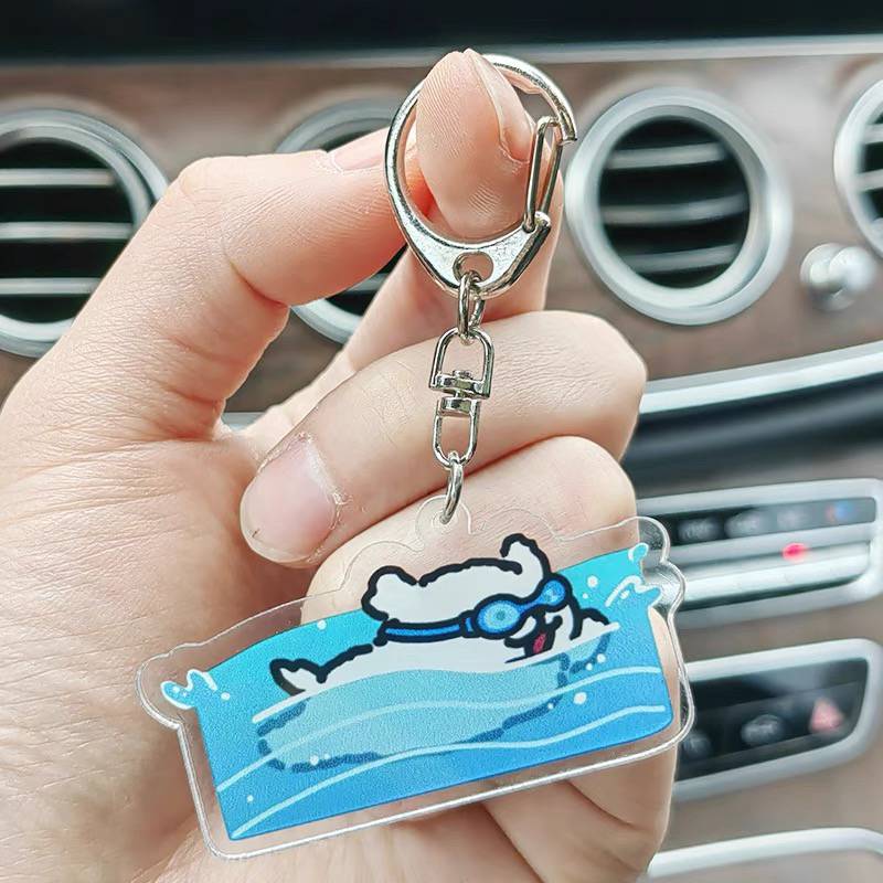 Cute high -value line puppy sports will play table tennis badminton basketball swimming keychain pendant around the puzzle games