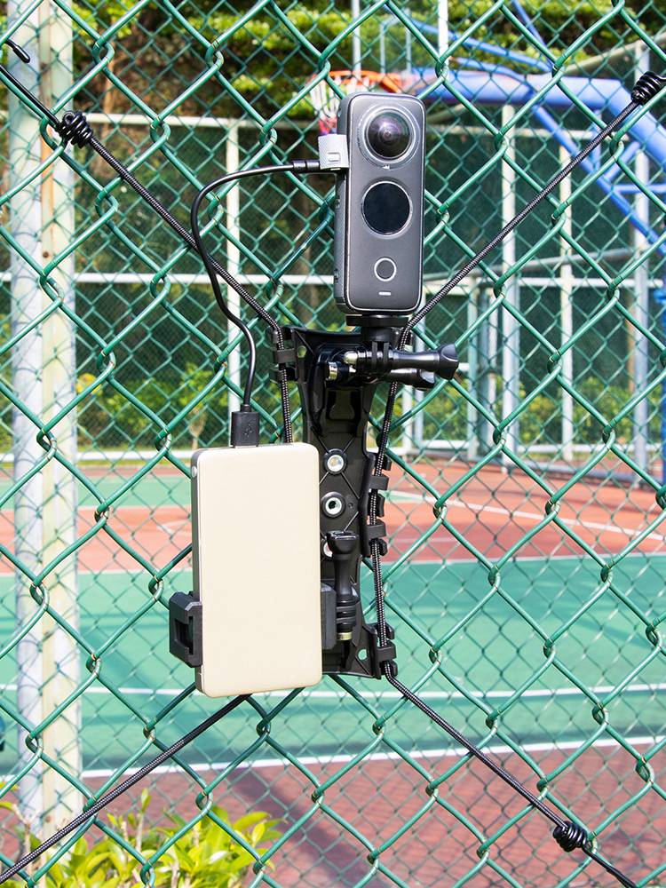 Sports camera phone fence fenced softball tennis court outside of the net