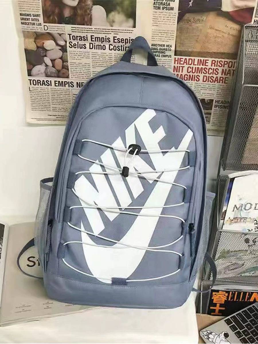 Nike Nike Men's and Women's Junior High School Students Large -capacity Travel Sports Specification Specifications Network Couples outdoor computer bag backbone bag