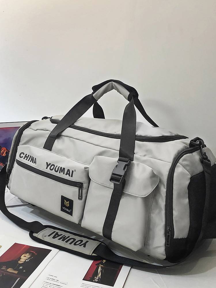 Short -distance travel backpack Large -capacity Female fitness bag men's dry and wet separation sports backpack light hand -raised Li bag