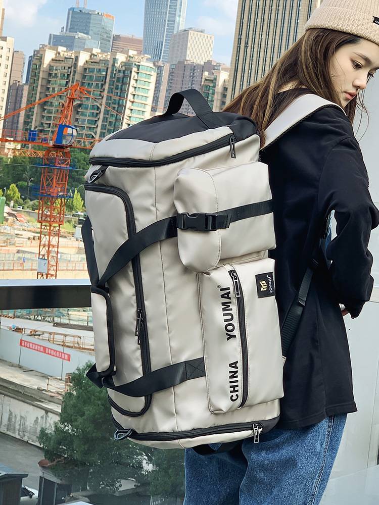 Short -distance travel backpack Large -capacity Female fitness bag men's dry and wet separation sports backpack light hand -raised Li bag