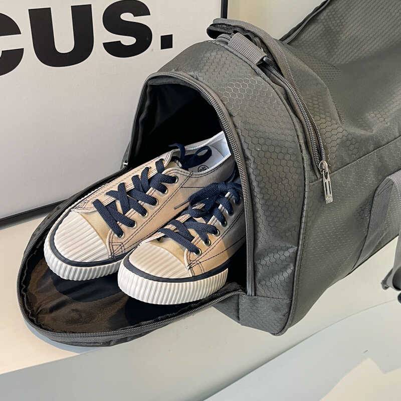 Wide brand sports men's travel bag large -capacity waterproof and fitness bag out of luggage storage bag hand ranging babes cool