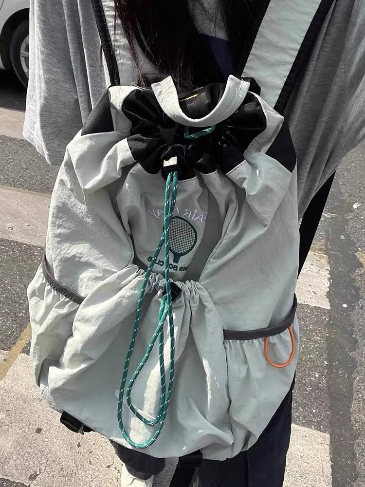 Japan's original single light badminton backpack outdoor climbing bag folding casual men and women large capacity short -distance travel bags