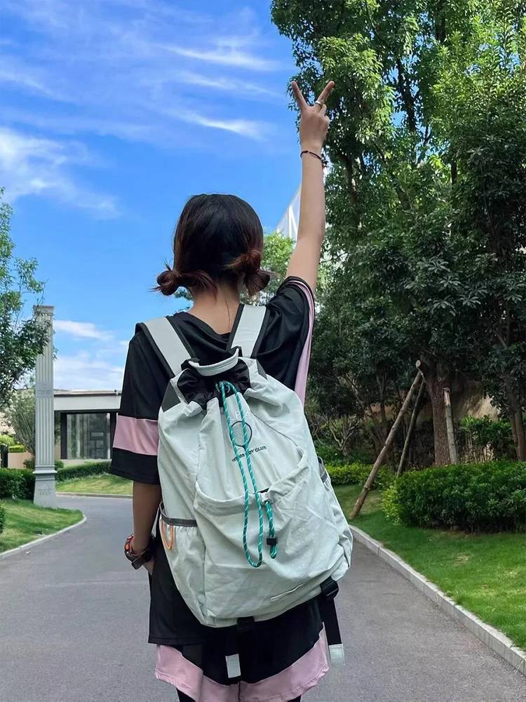 Japan's original single light badminton backpack outdoor climbing bag folding casual men and women large capacity short -distance travel bags