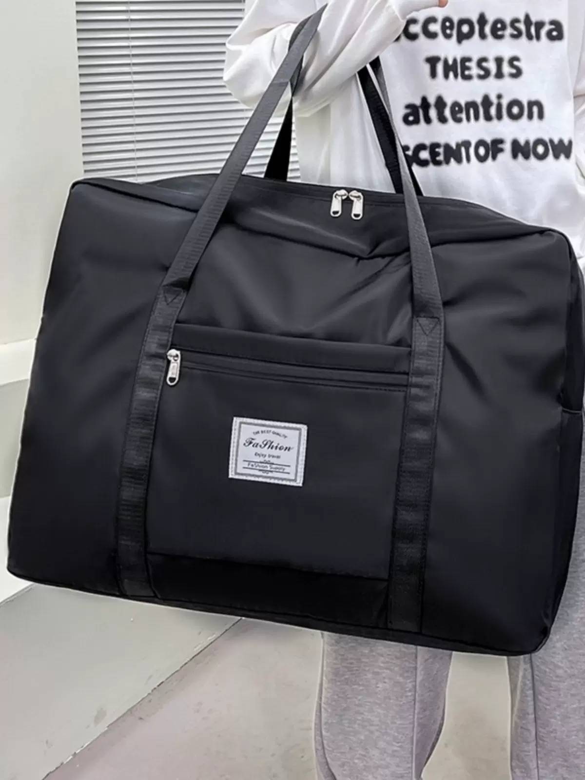Large -capacity Travel Breakthrough Lifting Bubble Women's Wide Wide Waterproof Luggage Bag Male Short -distance Disposal Travel Breeding Package