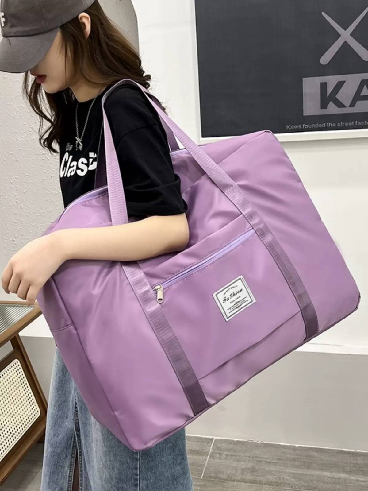 Large -capacity Travel Breakthrough Lifting Bubble Women's Wide Wide Waterproof Luggage Bag Male Short -distance Disposal Travel Breeding Package