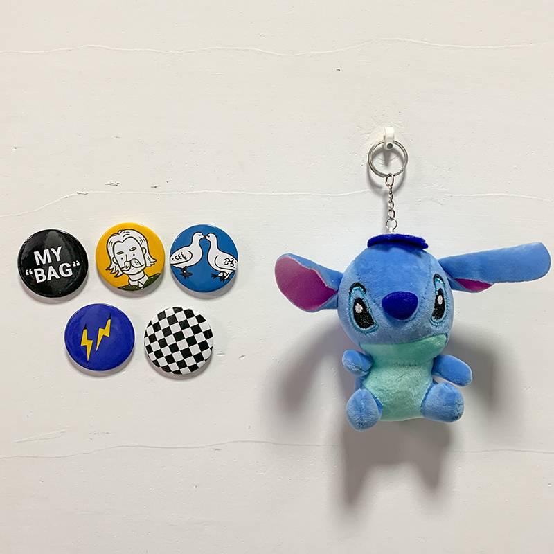 STIFLER HANGS UP A + LH5 BADGE