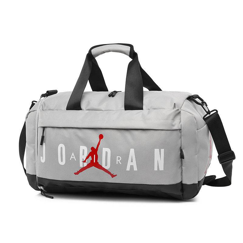Flying Man Slippery with a big volume of new football shoes and a dry and wet separation sports basketball bag with a big American handbag