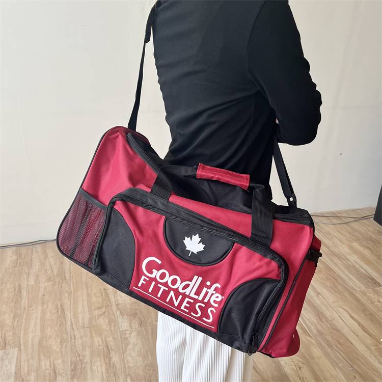 Black-red-red-coloured, slash-and-trip gym bag bag