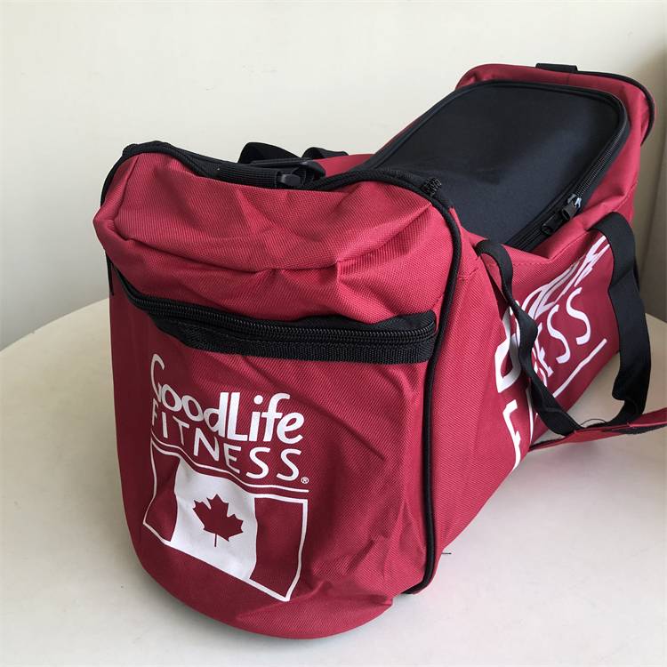 Black-red-red-coloured, slash-and-trip gym bag bag