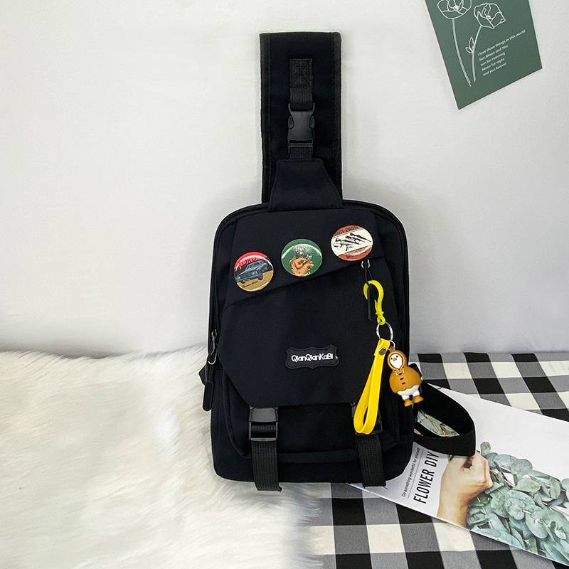 Black + 3 badges + duck in raincoat