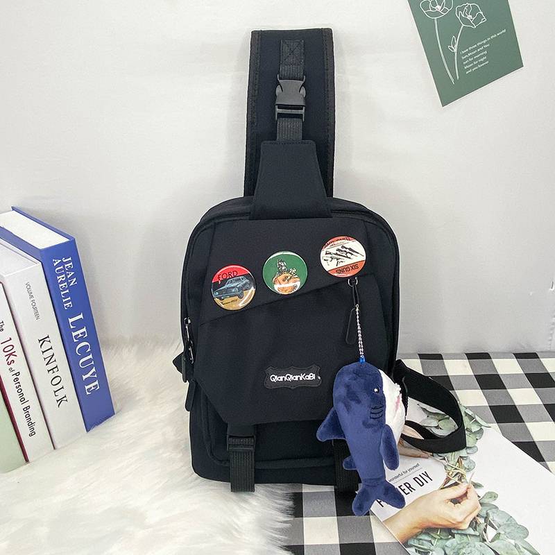 Black + 3 badges + big shark hanging
