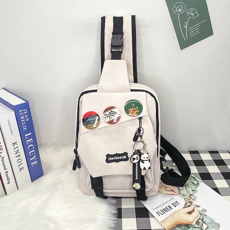 White + 3 badges + geometric panda hanging