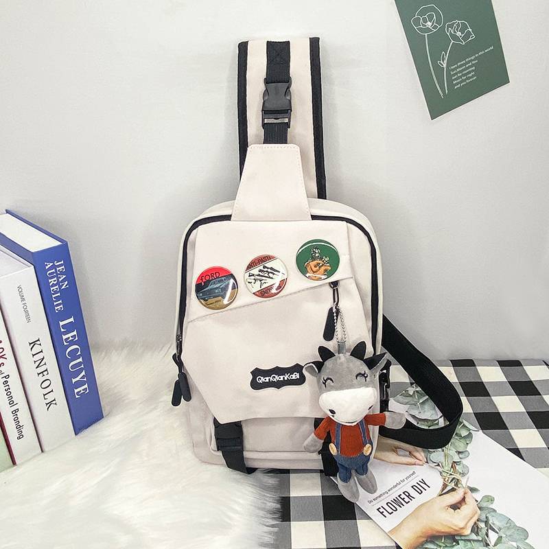 White + 3 badges + cattle strapped