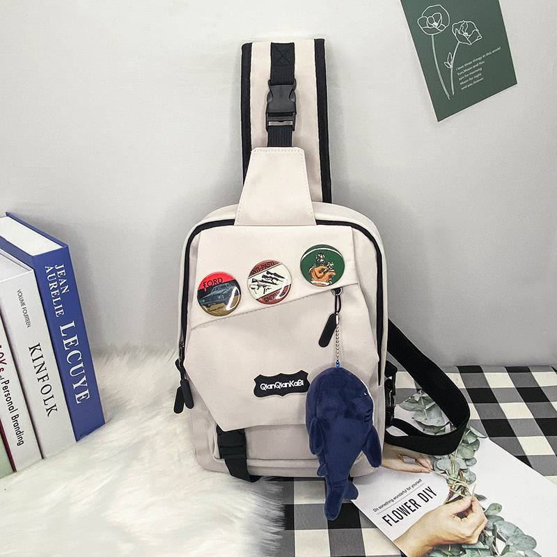 White + 3 badges + big shark hanging