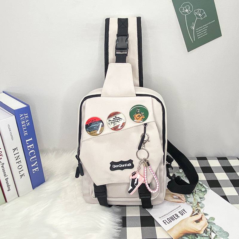 White + 3 badges + pink-tide shoe hanging