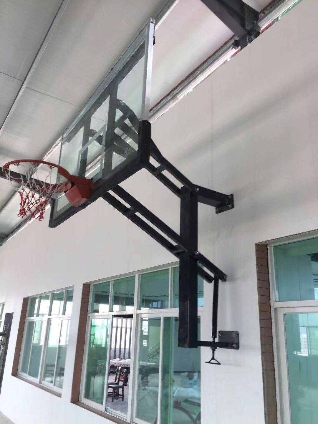 Black children's hand shake up and down basketball rack
