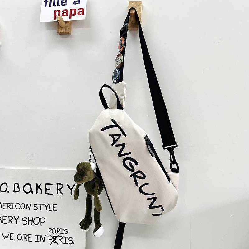 White + three random badges + frog