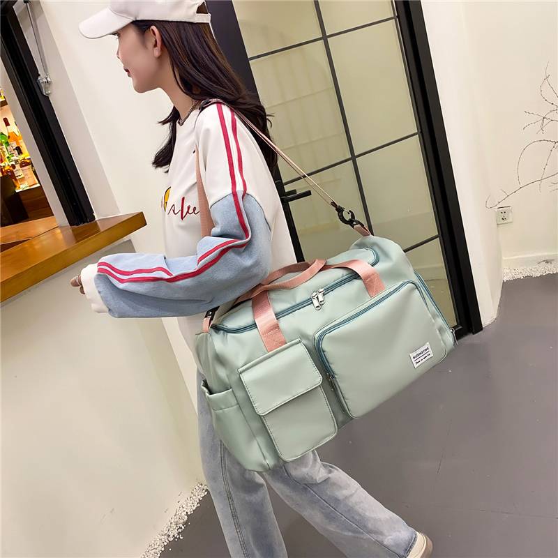 Short -distance travel package female large capacity lightweight, hand -wet, wet separation sports pack student luggage package male travel travel