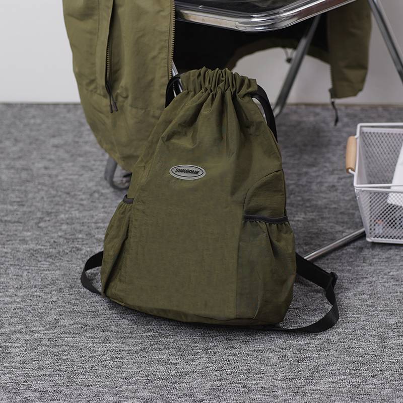 Pumping rope Backpack female 2024 new beam pocket sports lightweight backpack travel bag men's outdoor minimalist backpack