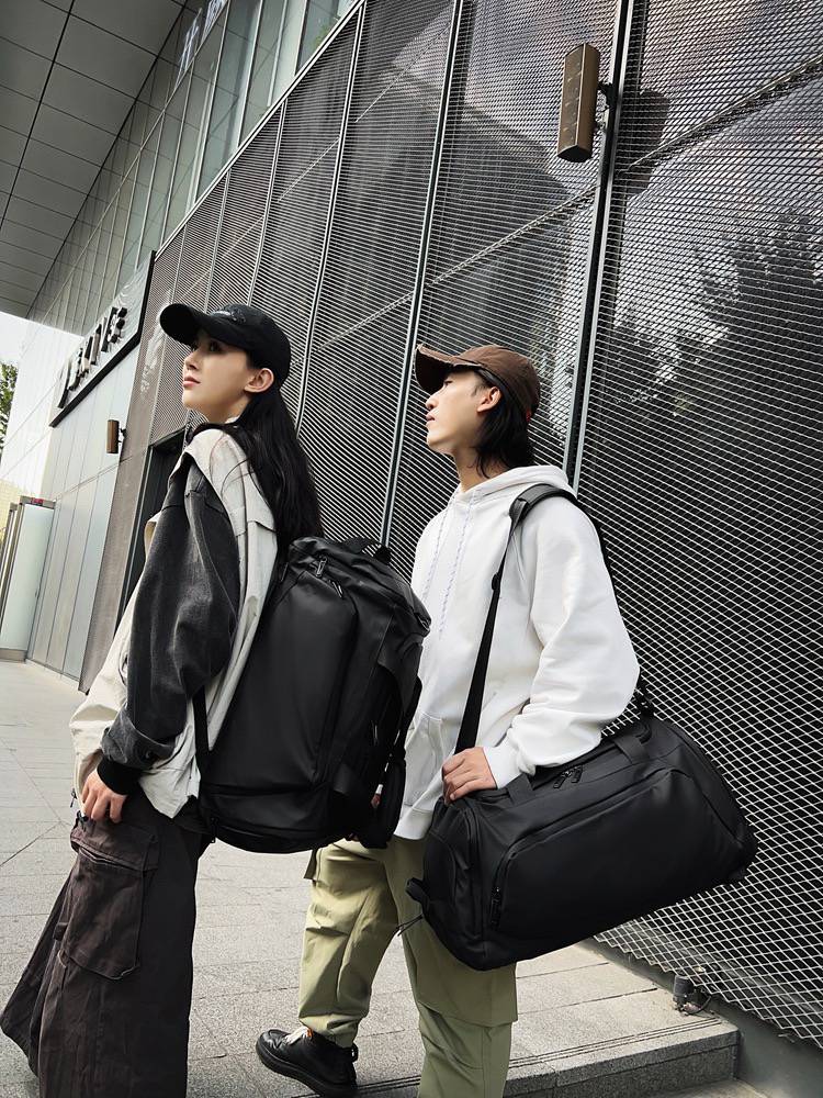 The new large -capacity handiches, travel men's basketball bag luggage bag dry wet, wet wet sports fitness bag female travel back shoulders