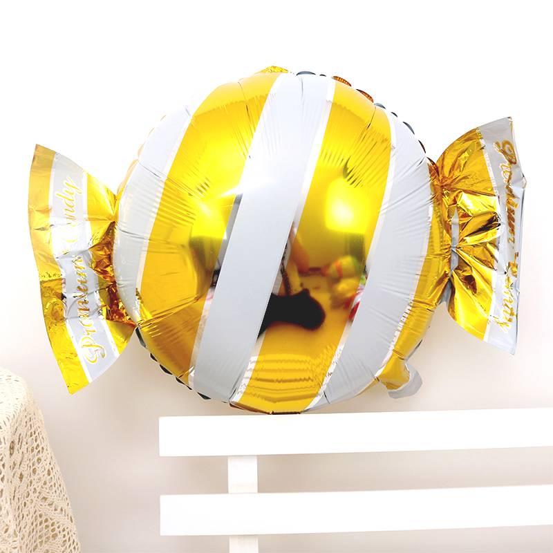 Large golden striped candy