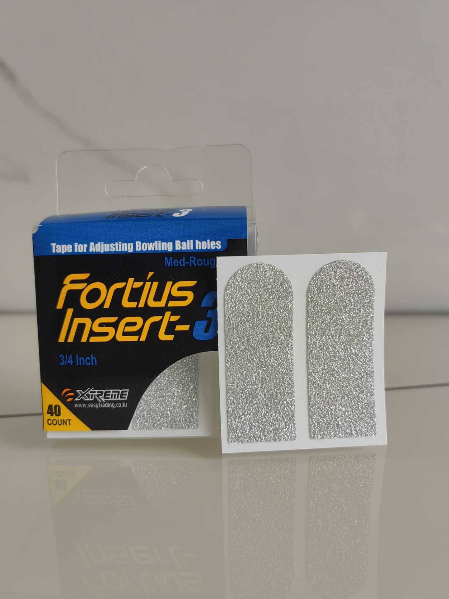 The Xtreme brand bowling finger hole finger patch FIRTIUS Insetr adjust the finger hole size and the touch touch