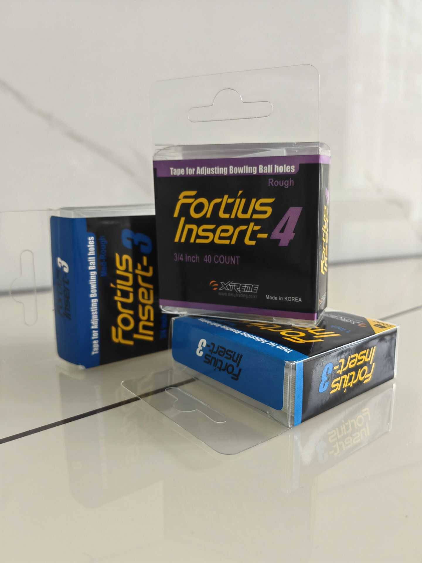 The Xtreme brand bowling finger hole finger patch FIRTIUS Insetr adjust the finger hole size and the touch touch